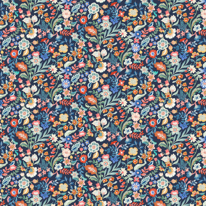 Patterned fabric with colorful floral design on a dark blue cotton quilting fabric