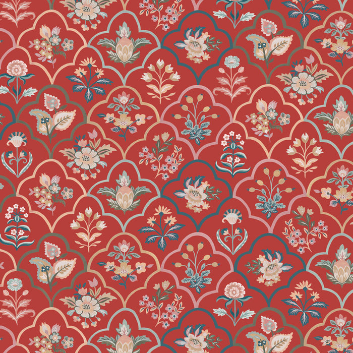 Decorative floral pattern on a red cotton quilting fabric