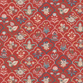 Decorative floral pattern on a red cotton quilting fabric