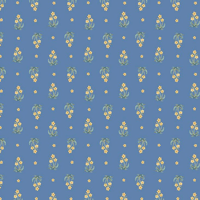 Small yellow flowers on a blue cotton quilting fabric