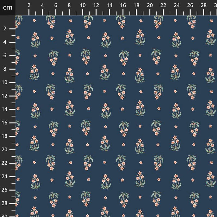 Floral patterned fabric swatch on a navy background with a ruler for scale.
