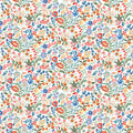 Colorful floral pattern on a white cotton quilting fabric