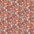 Patterned fabric with floral design on a red cotton quilting fabric