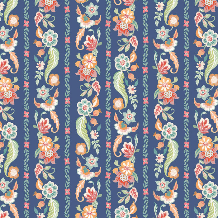 Floral pattern with colorful flowers and leaves on a blue cotton quilting fabric