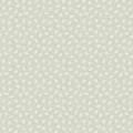 Patterned cotton quilting fabric with small white leaves on a light gray background