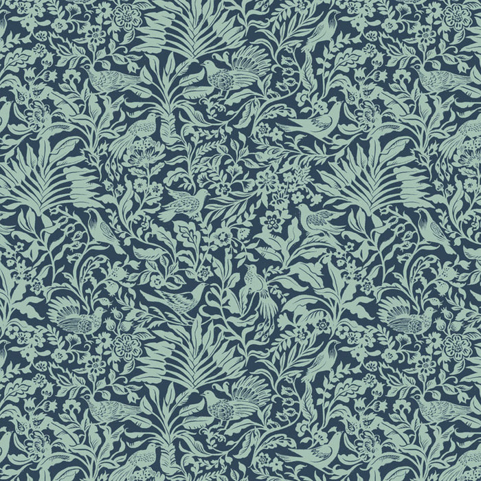 Patterned fabric with green leaves and birds on a dark blue cotton quilting fabric