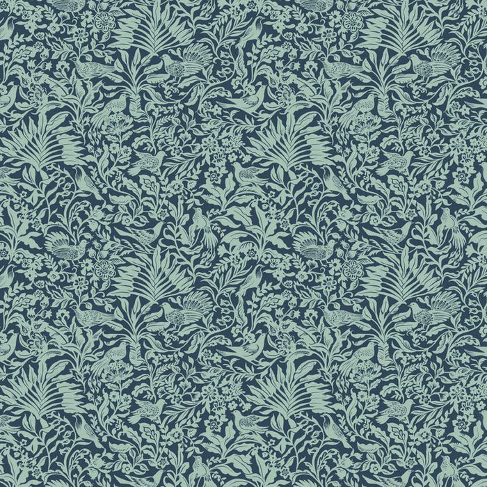 Patterned fabric with green leaves and birds on a dark blue background
