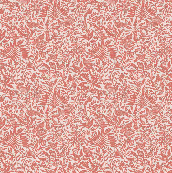 Patterned fabric with red and white design on a pink cotton quilting fabric
