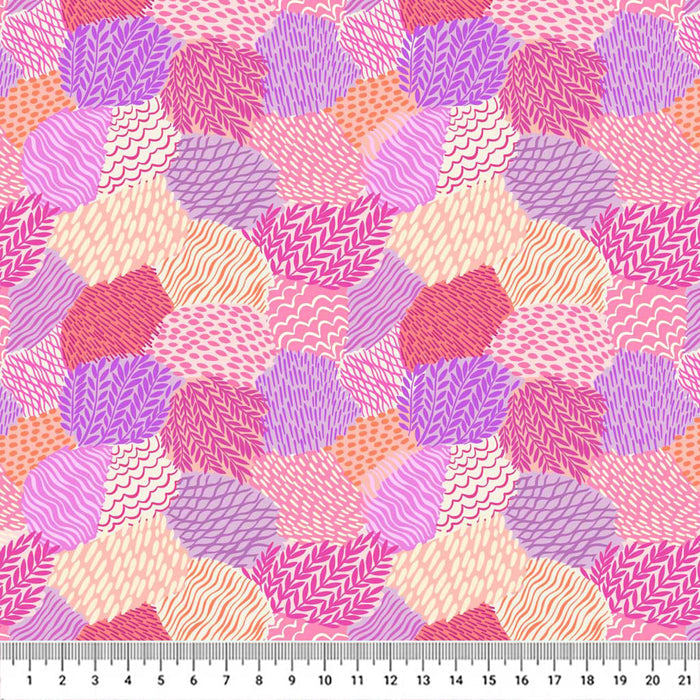 Pink and purple patchwork printed on a cotton quilting fabric with a cm ruler