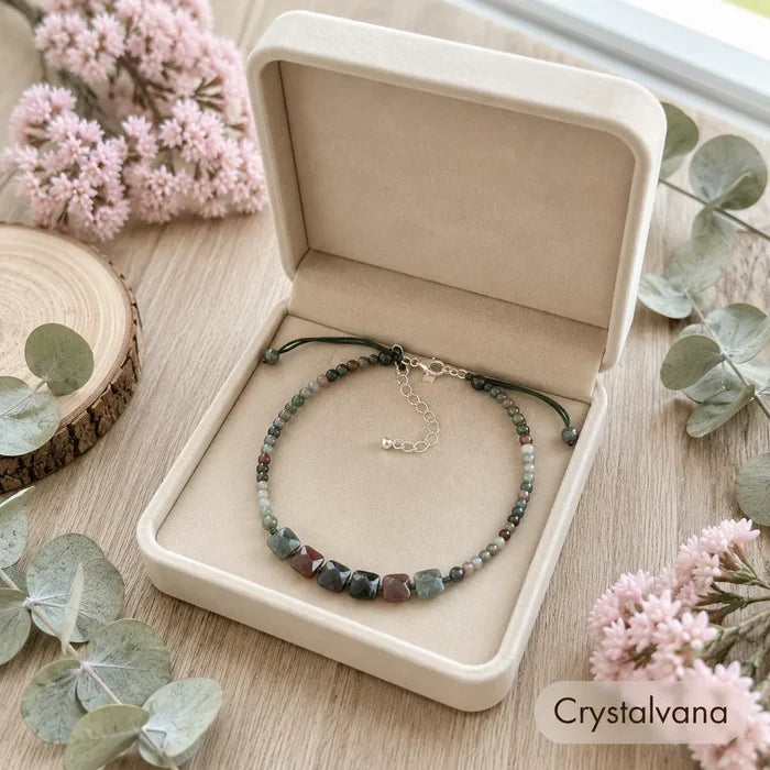 Bloodstone choker flat lay on wood slice showing gold clasp extender, Crystalvana