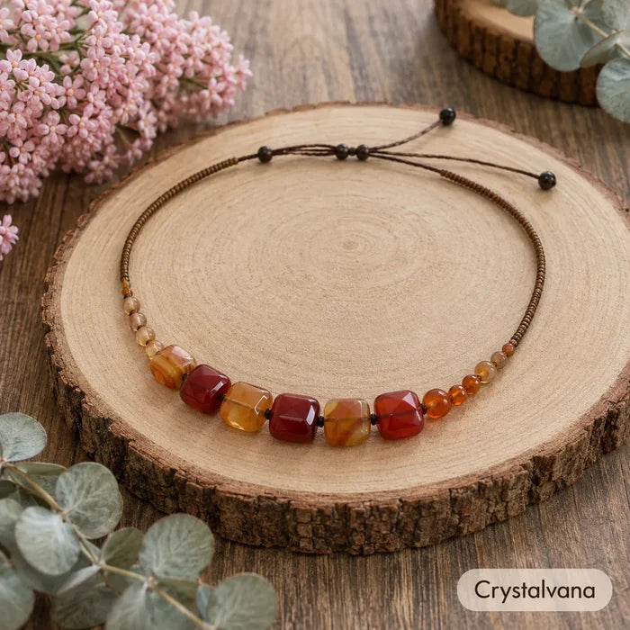 Model smiling hand on hair wearing natural red agate choker necklace, Crystalvana