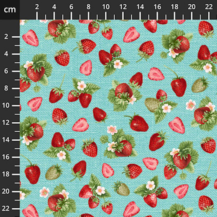 Fabric with strawberry pattern on a blue background, measured against a ruler.