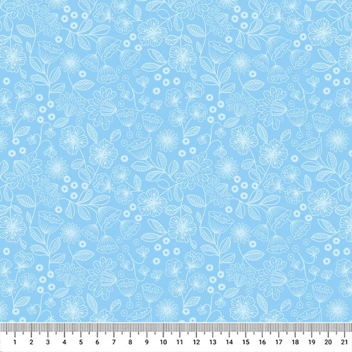 Wildflowers printed on a sky blue cotton quilting fabric with a cm ruler
