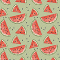 Pattern of watermelon slices on a green cotton quilting fabric