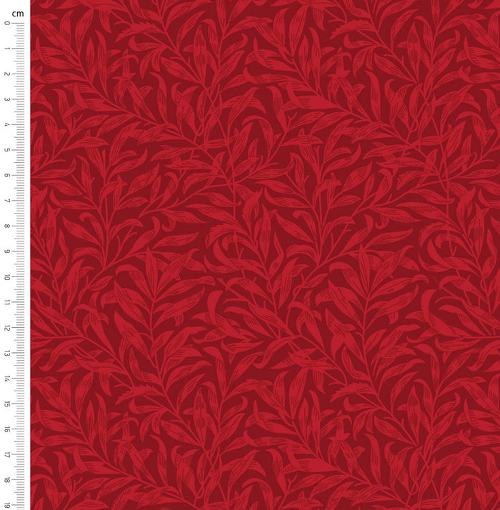Cherry red willow bough design printed on quilting fabric with a cm ruler